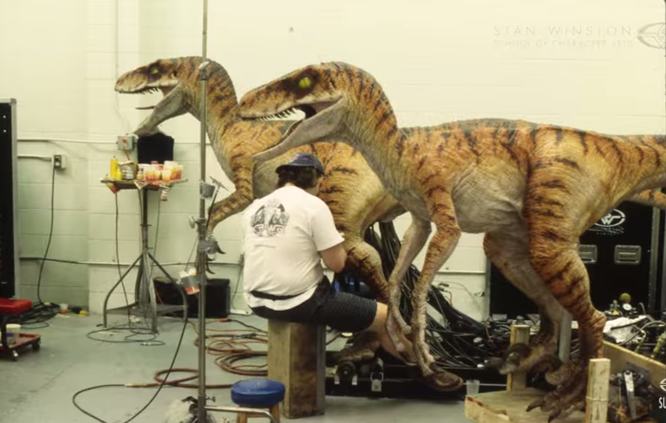 Two of the animatronic raptors from the film. There also featured two additional puppets with human actors within the bodies, and an attached animatronic head to control facial movement.